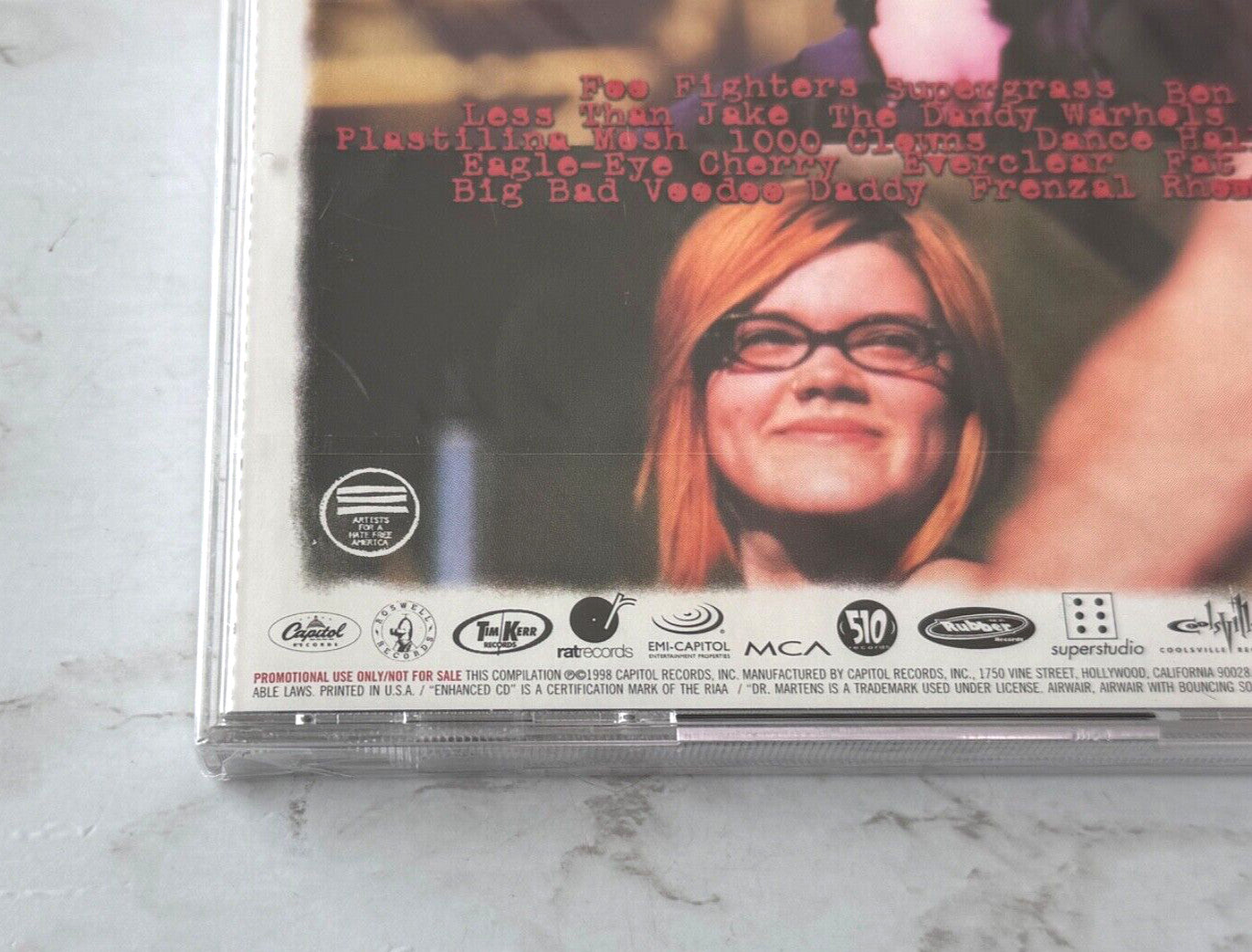 Foo Fighters, Less Than Jake, Plastilina Mosh, Various – Dr. Martens/Capitol Records Music Sampler (Promo) (1998)