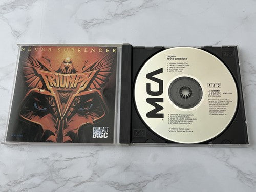 Triumph – Never Surrender [JAPAN TARGET ERA]