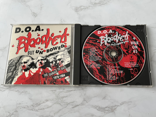 D.O.A. – Bloodied But Unbowed / War On 45 (1992) [CANADA PRESS]