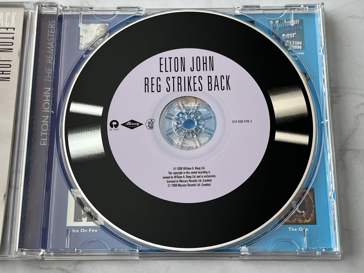 Elton John – Reg Strikes Back (The Remasters) (1998)