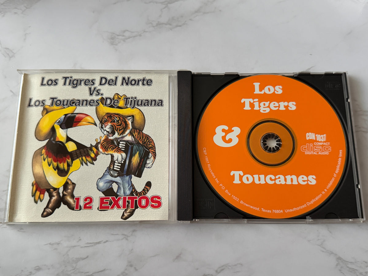 Los Tigres Del Norte / Los Tucanes De Tijuana – 12 Éxitos (1997)