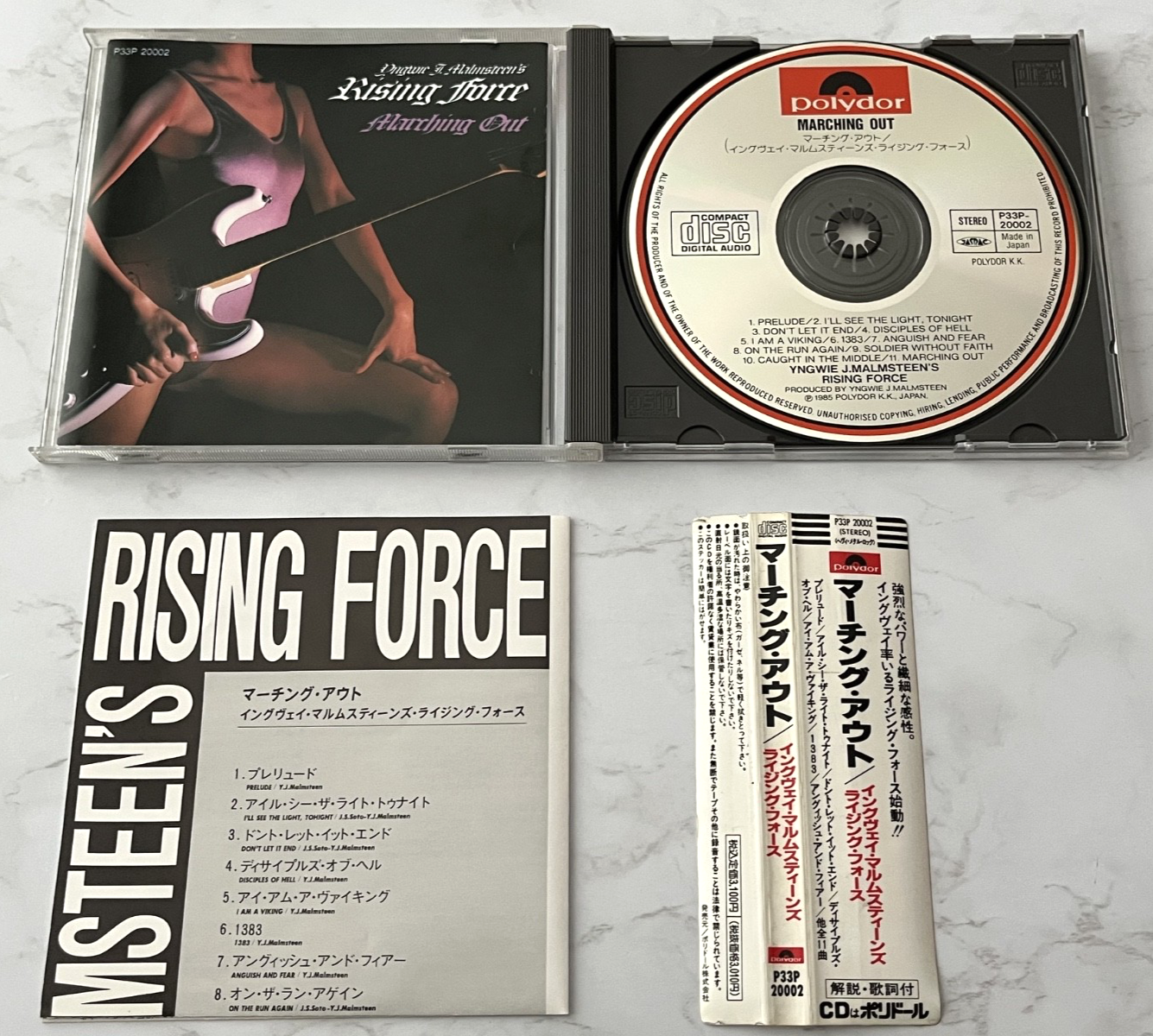 Yngwie Malmsteen – Yngwie J. Malmsteen's Rising Force Marching Out (1985)