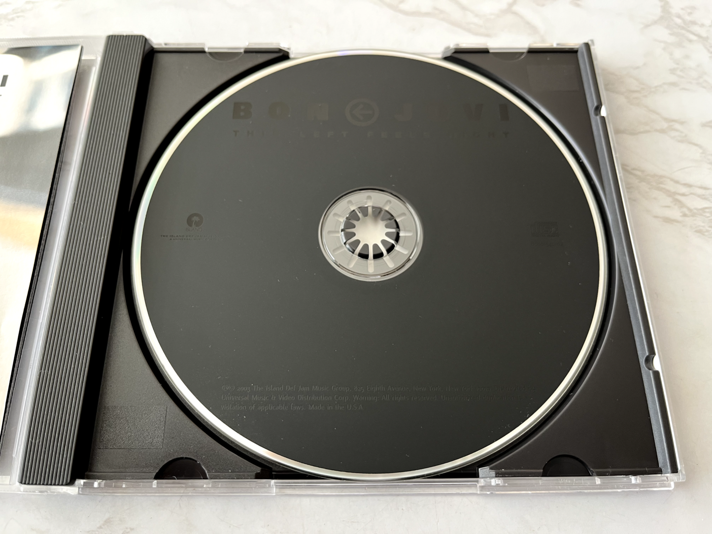 Bon Jovi – This Left Feels Right (2003)