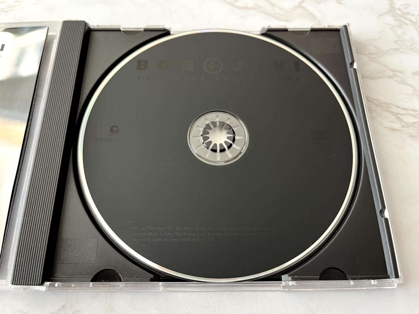 Bon Jovi – This Left Feels Right (2003)
