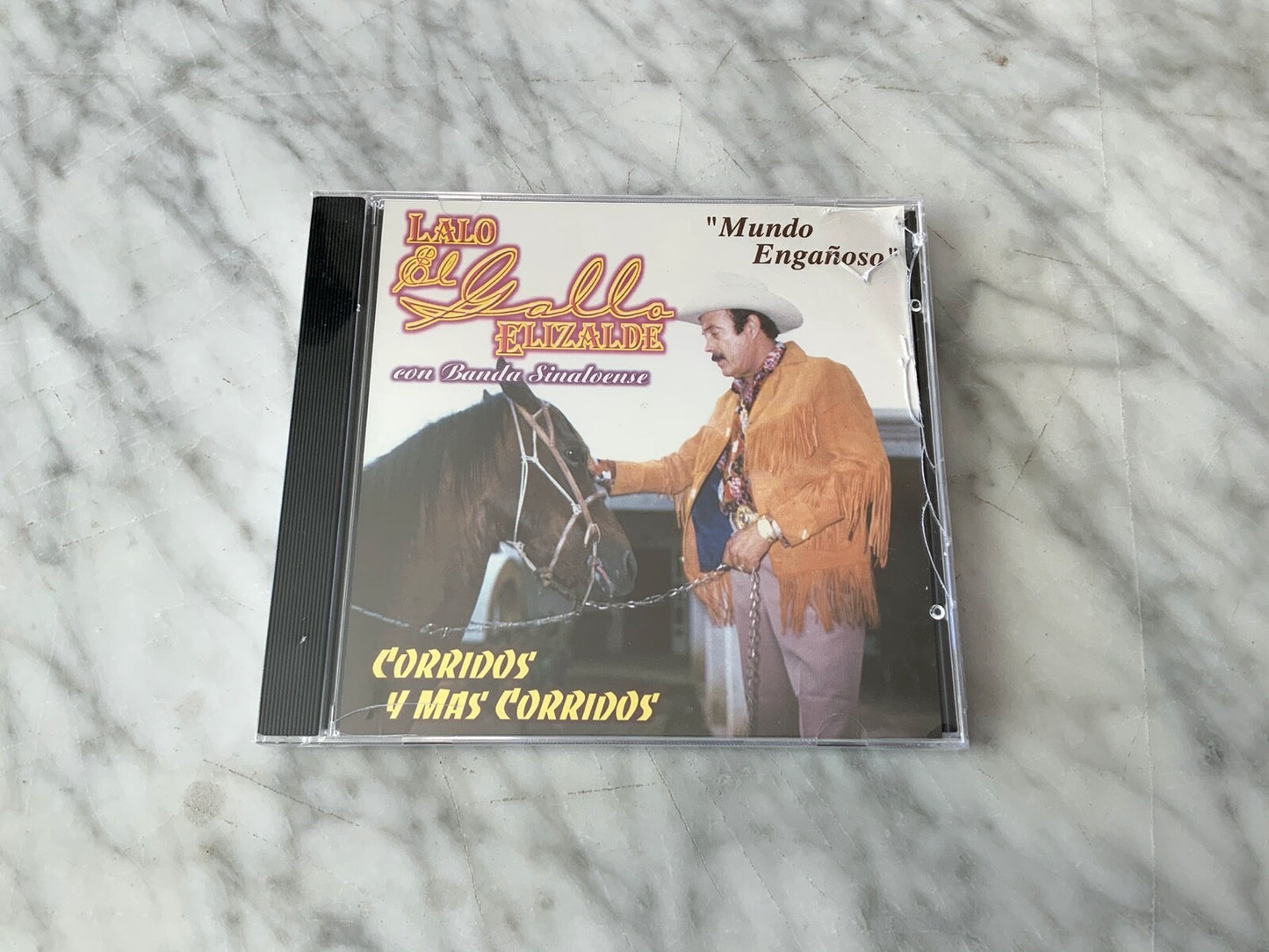 Lalo Elizalde – El Gallo Mundo Engañoso (1998)