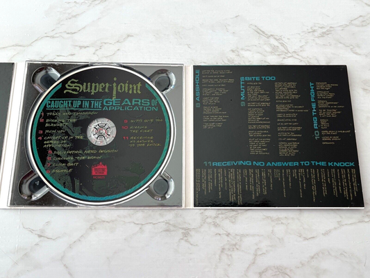 Superjoint – Caught Up In The Gears Of Application (Digipak) (2016)