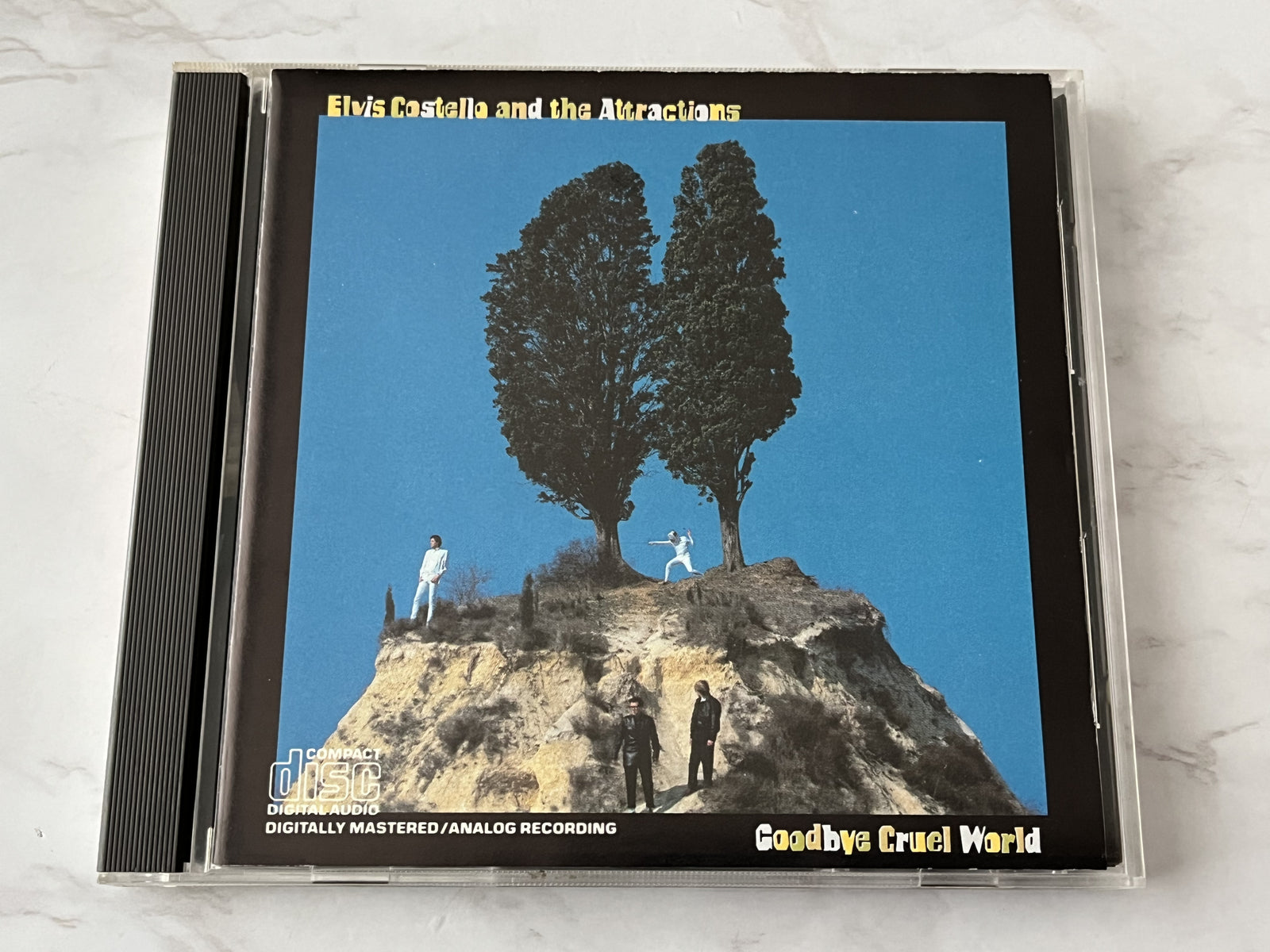 Costello, Elvis & the Attractions, Elvis Costello And The Attractions – Goodbye Cruel World