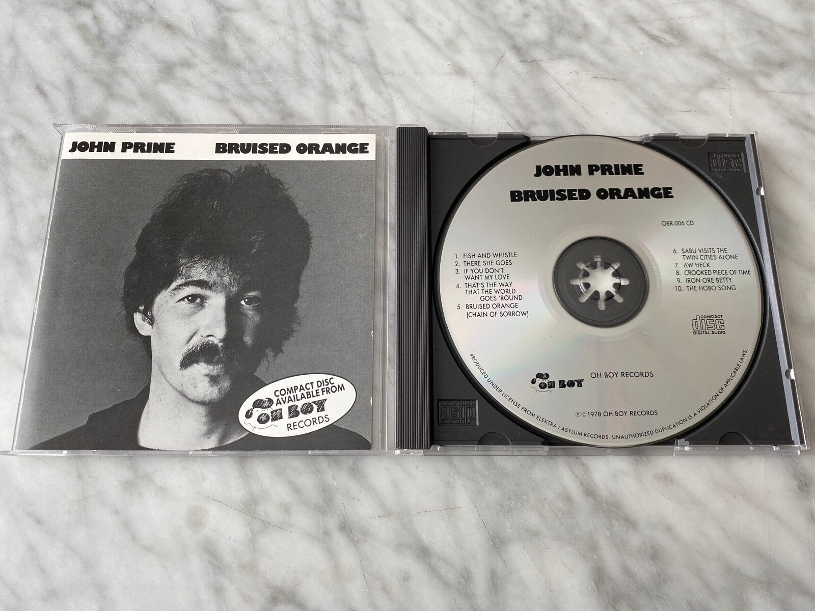 John Prine – Bruised Orange