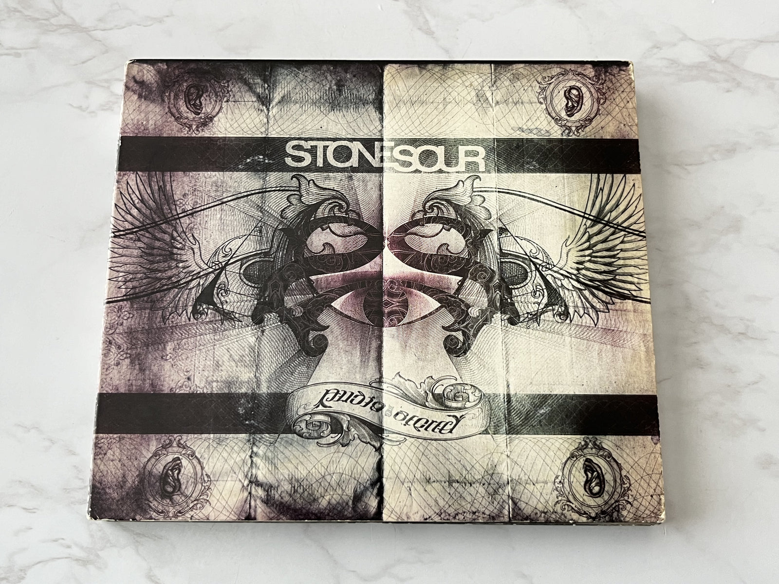 Stone Sour – Audio Secrecy (Deluxe Edition, Digipak, CD/DVD) (2010)
