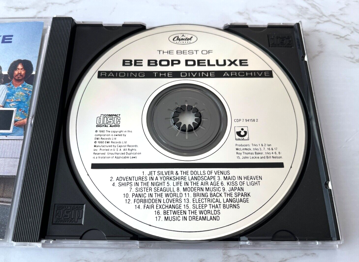 Be Bop Deluxe – Raiding The Divine Archive (1990)