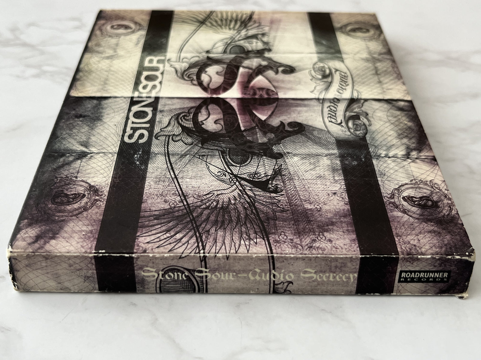 Stone Sour – Audio Secrecy (Deluxe Edition, Digipak, CD/DVD) (2010)