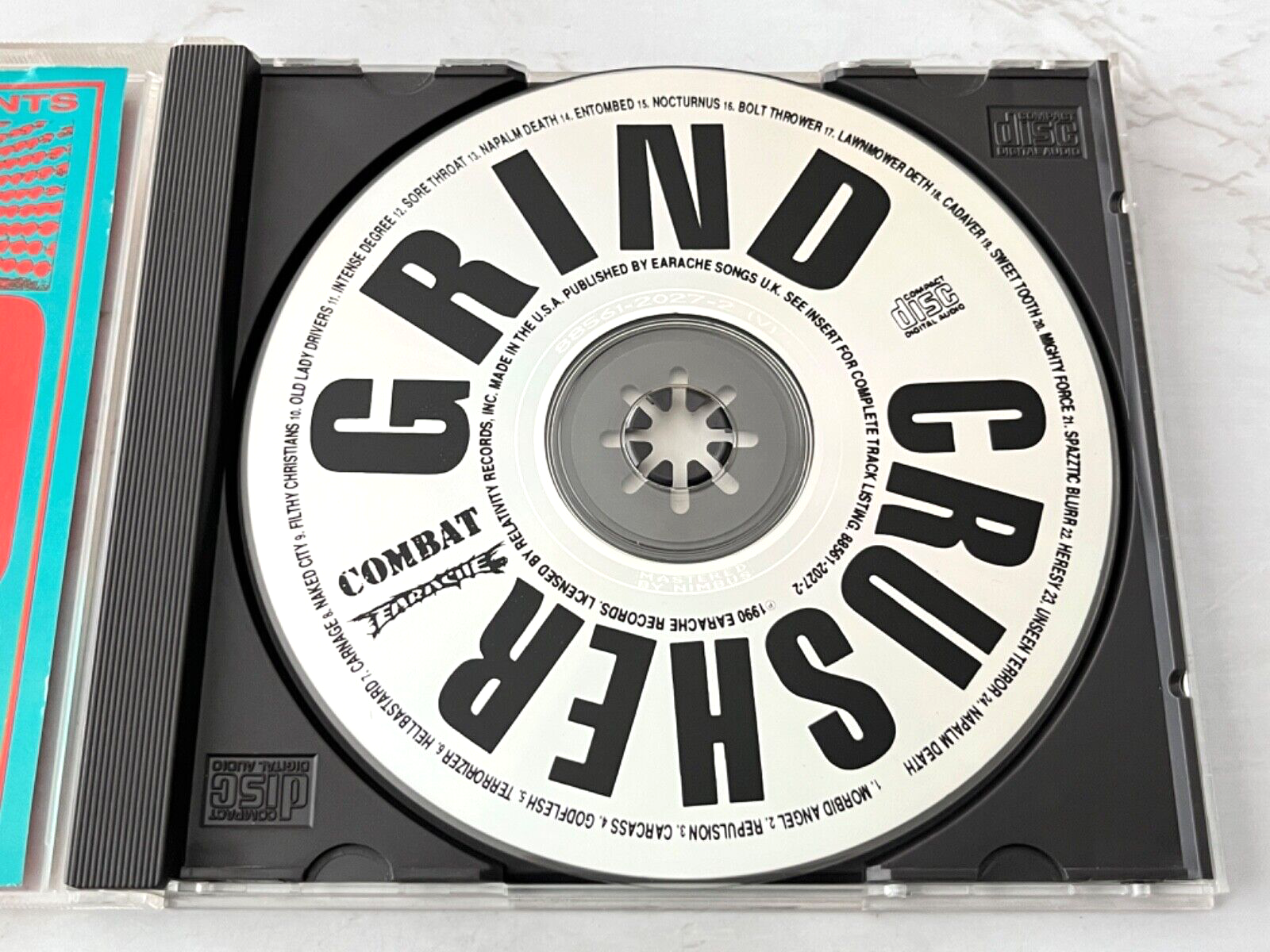 Morbid Angel, Napalm Death, Various, Carnage, Entombed, Bolt Thrower – Grind Crusher (1990)