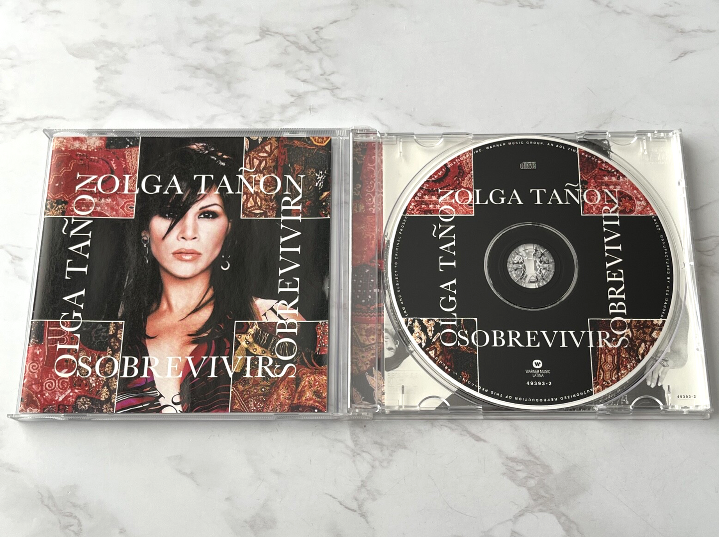 Olga Tañon – Sobrevivir (2002)