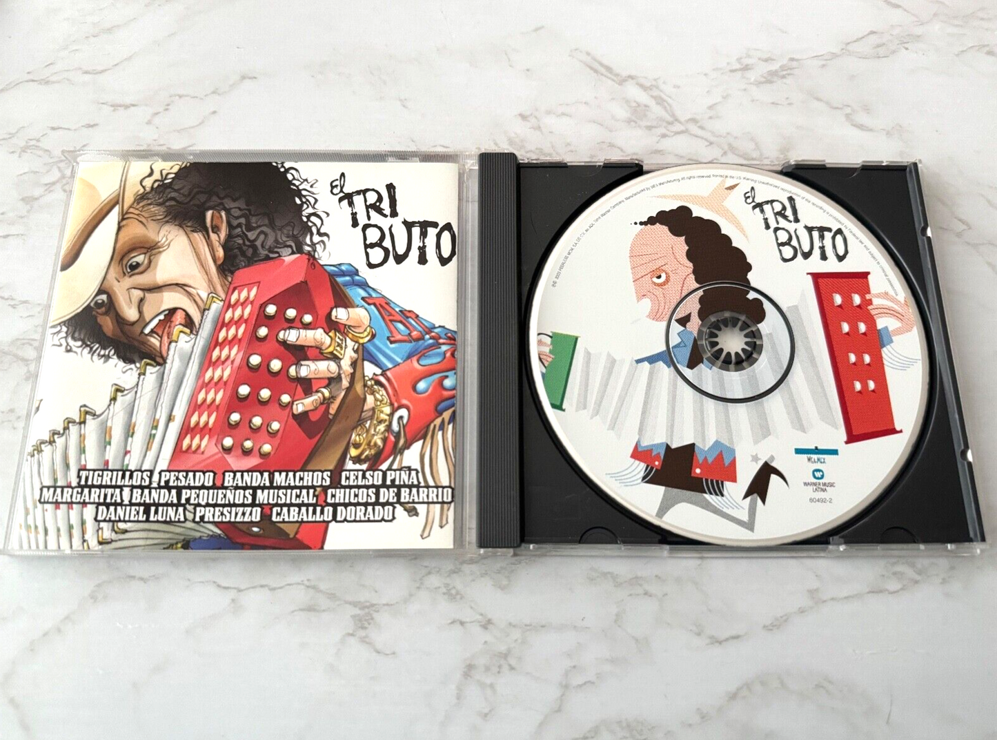 Various, Banda Machos, Pesado, Celso Piña – El Tributo (2003)