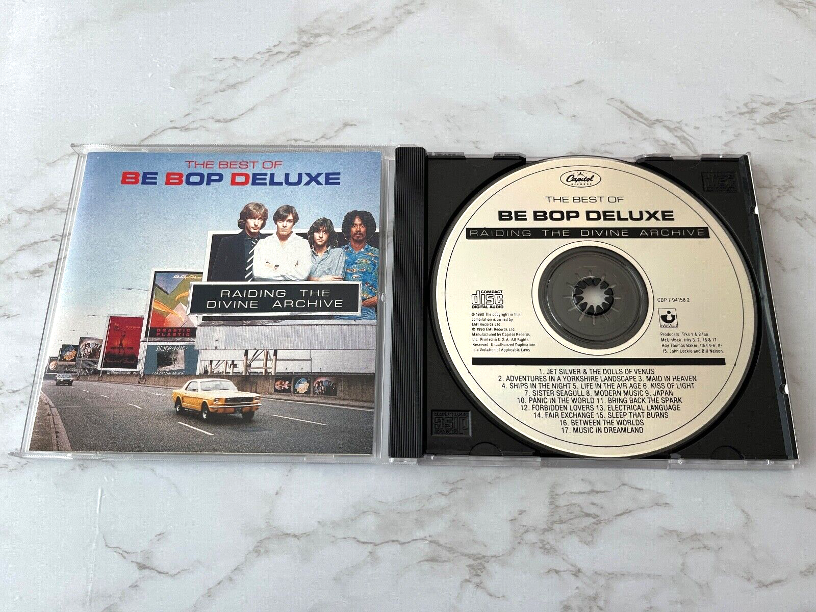Be Bop Deluxe – Raiding The Divine Archive (1990)