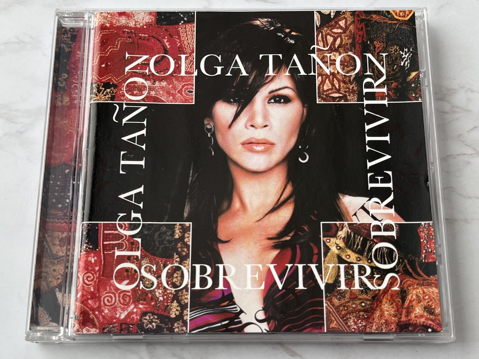 Olga Tañon – Sobrevivir (2002)