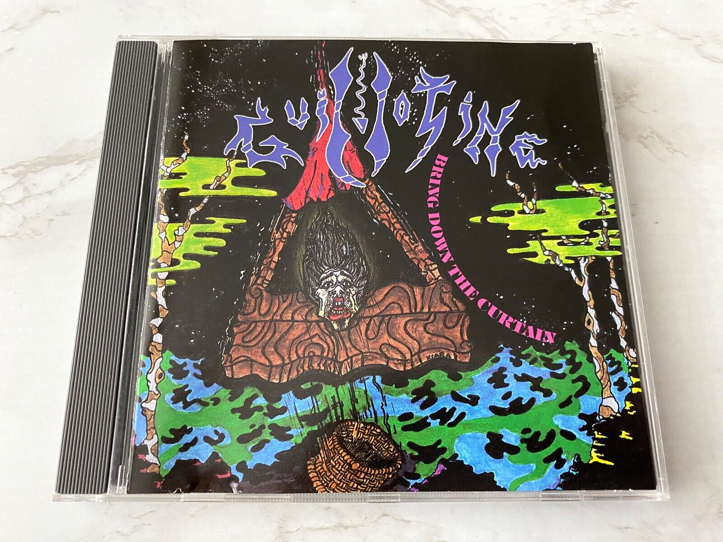 Guillotine – Bring Down The Curtain (1989)
