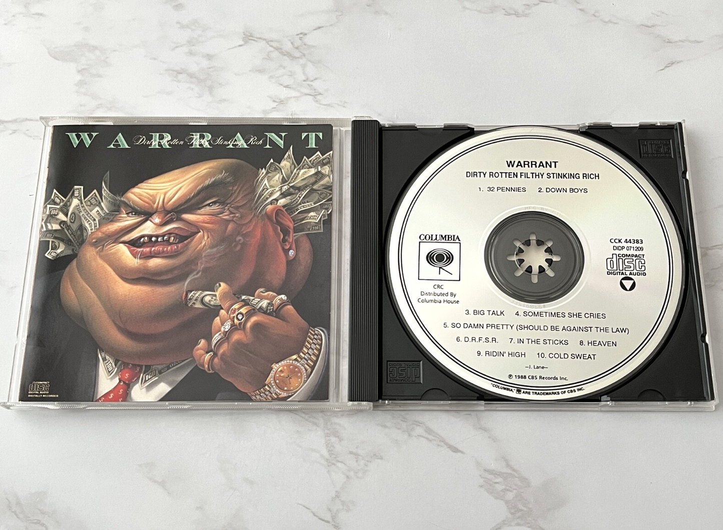 Warrant – Dirty Rotten Filthy Stinking Rich [CANADA PRESS]