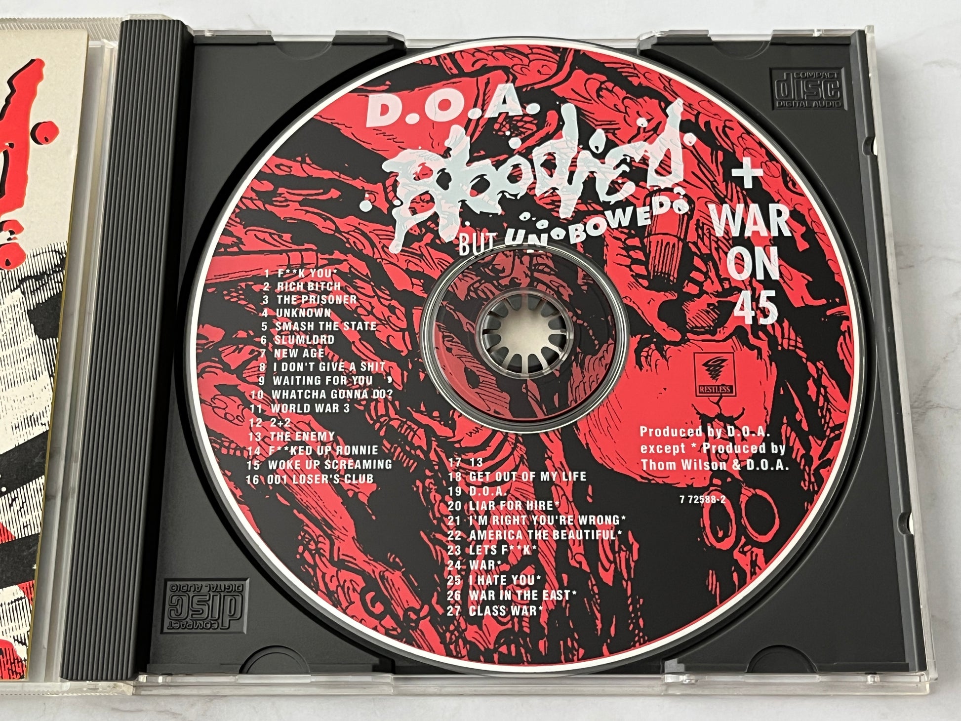 D.O.A. – Bloodied But Unbowed / War On 45 (1992) [CANADA PRESS]