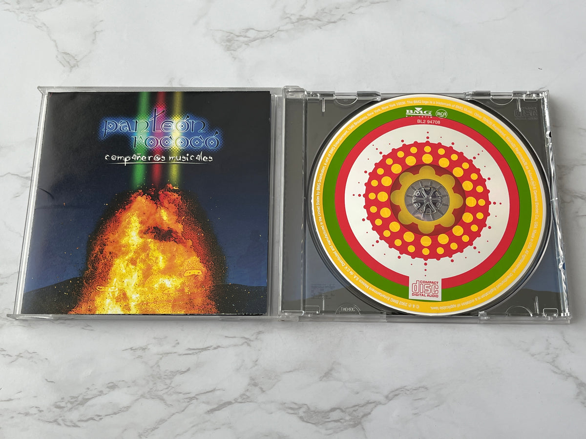Panteón Rococó – Compañeros Musicales (2002)