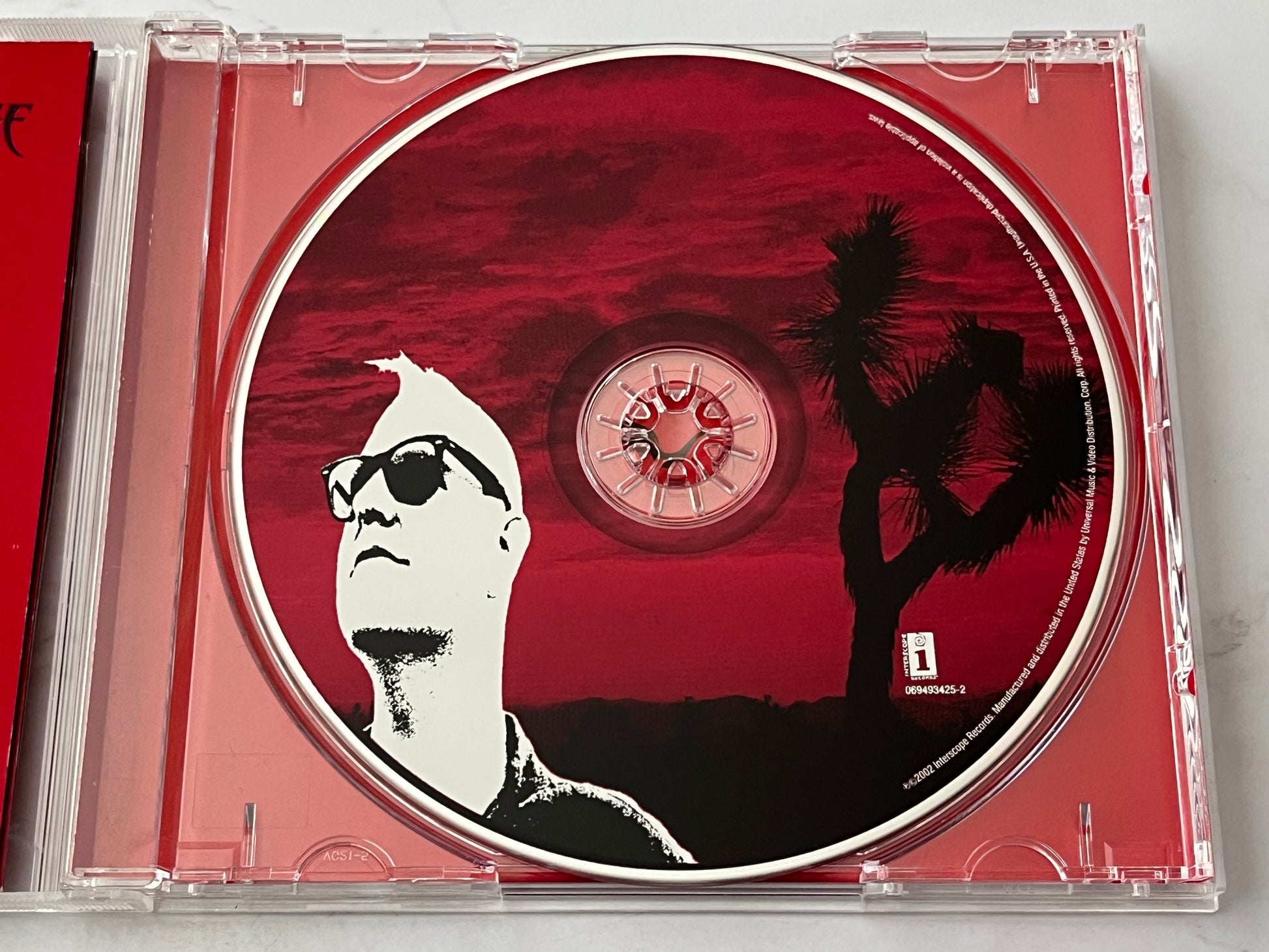 Queens of the Stone Age – Songs For The Deaf (2002)