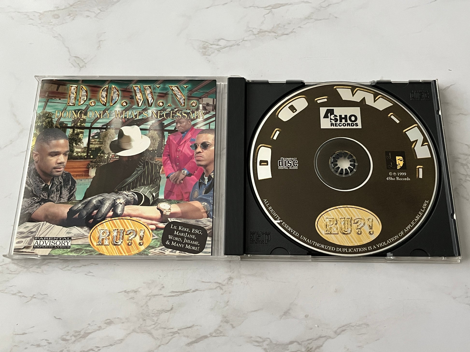 D.O.W.N. (Doing Only What's Necessary) – Ru?! (2000)
