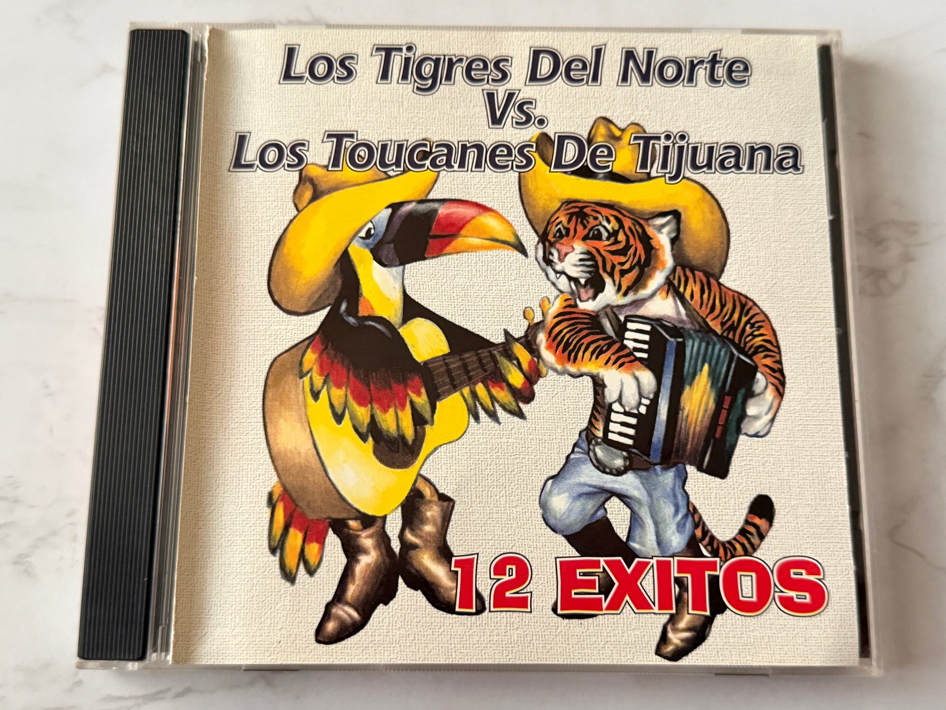 Los Tigres Del Norte / Los Tucanes De Tijuana – 12 Éxitos (1997)