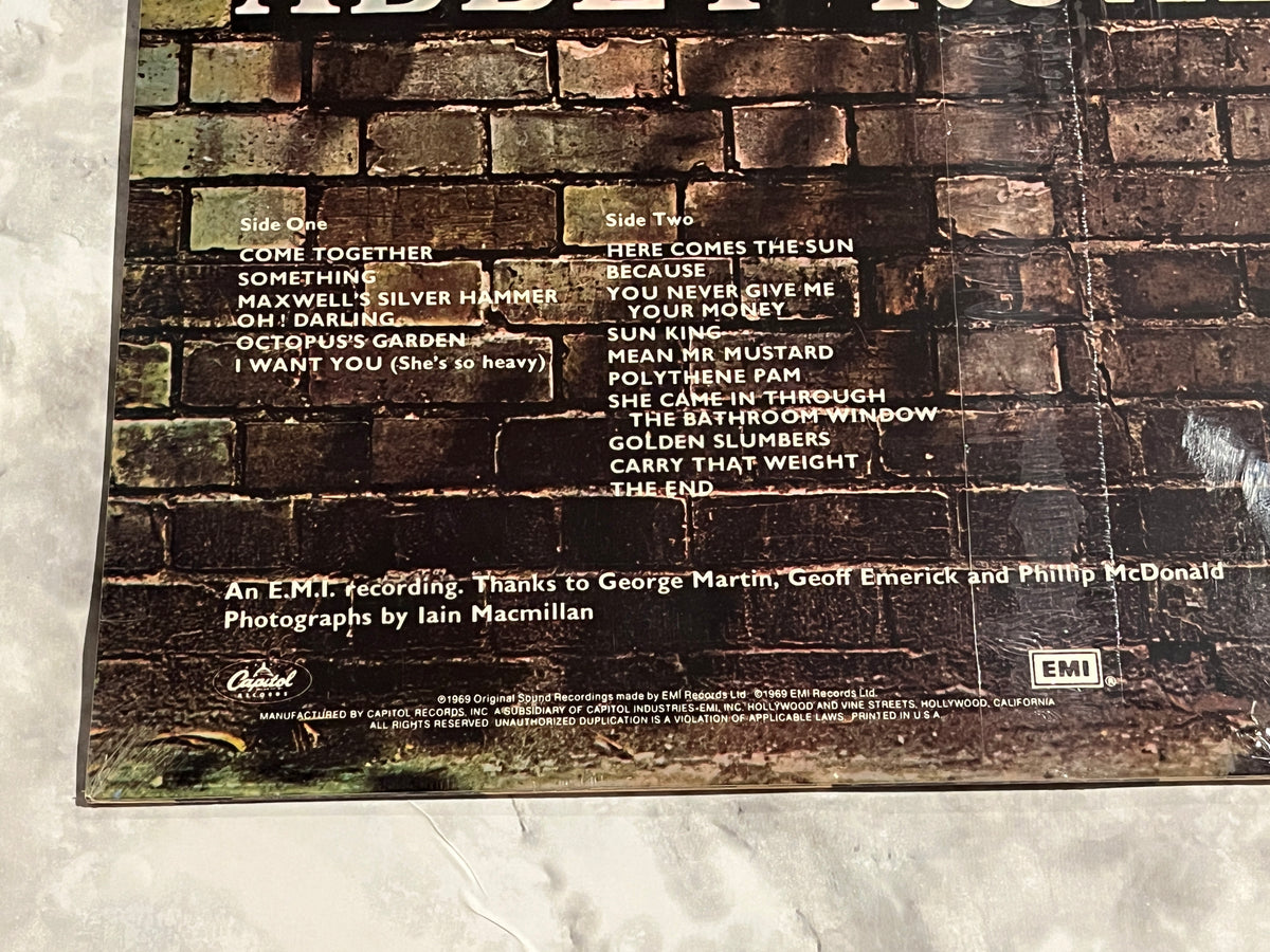 The Beatles Abbey Road LP SEALED! 1988 Capitol C1-46446 PROMO PUNCHED HOLE!