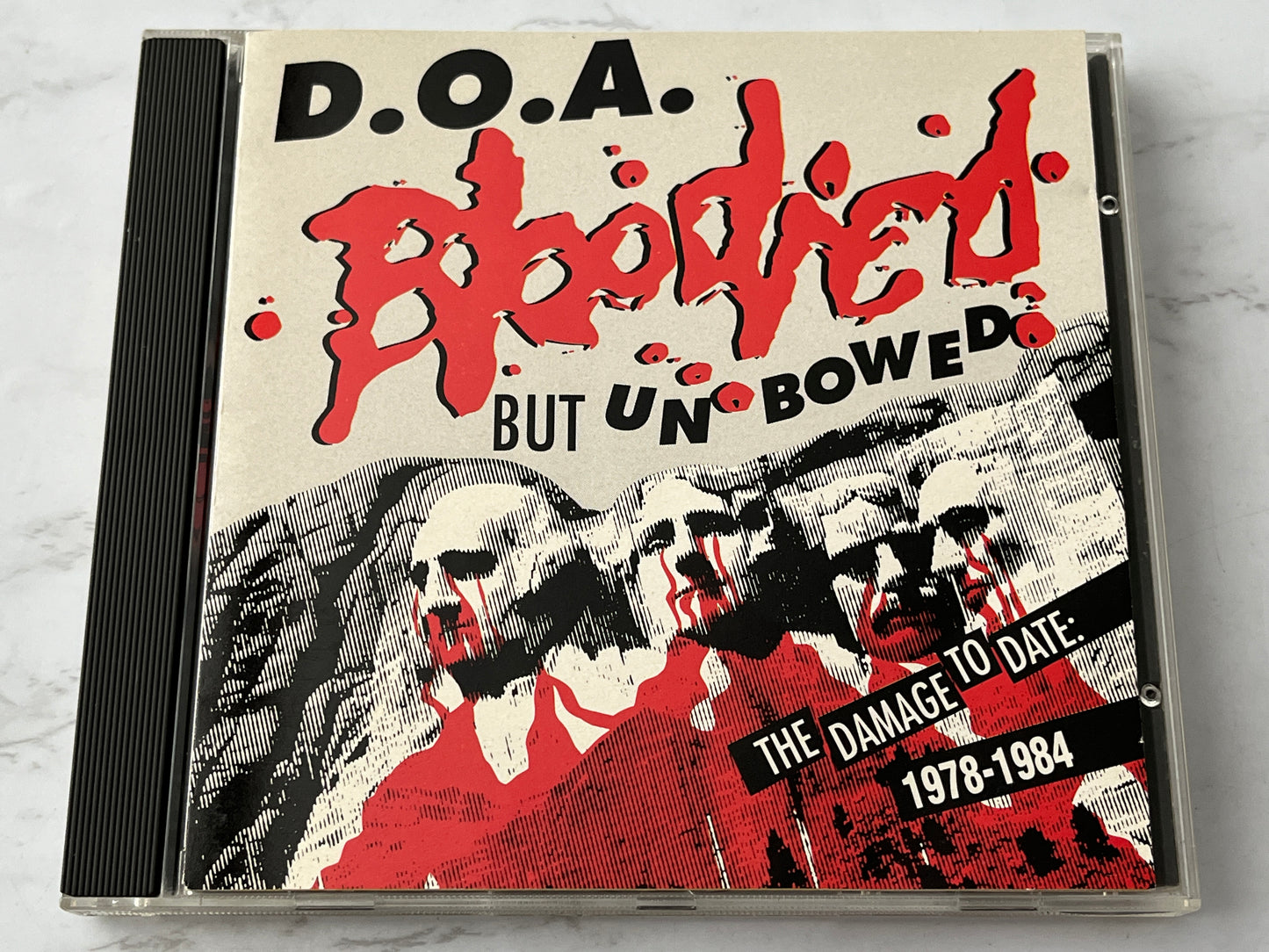 D.O.A. – Bloodied But Unbowed / War On 45 (1992) [CANADA PRESS]