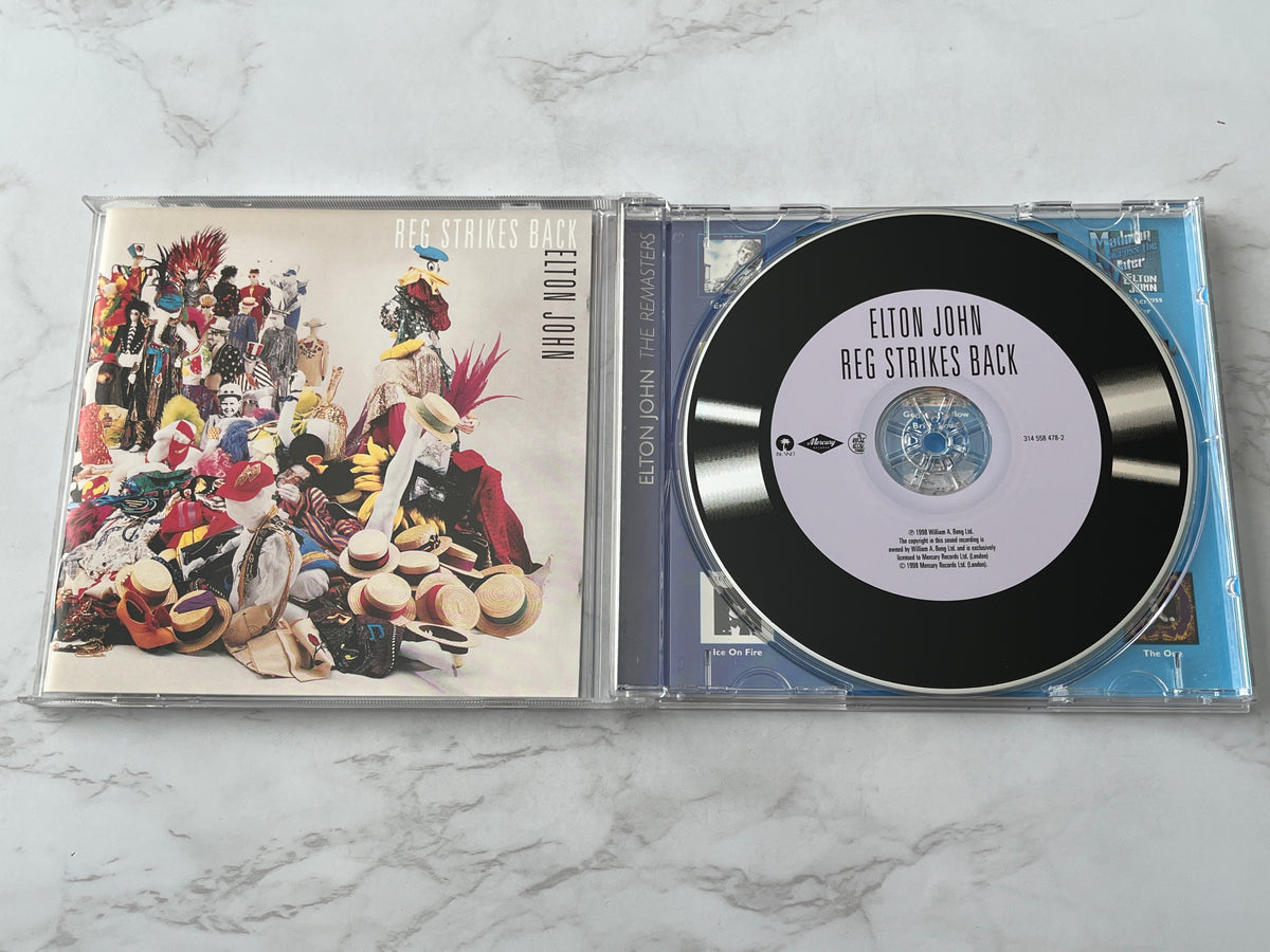 Elton John – Reg Strikes Back (The Remasters) (1998)