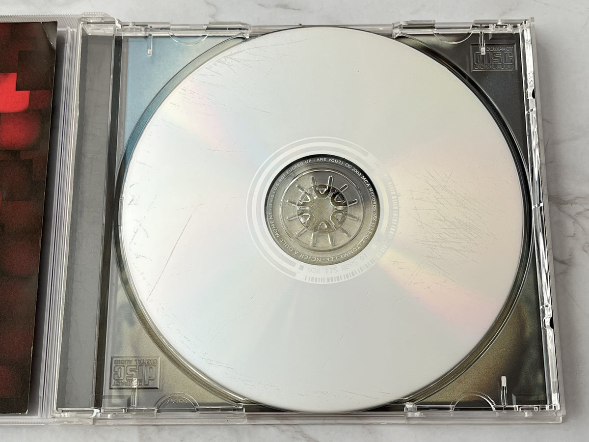 Tommy Lee – Never A Dull Moment (2002)