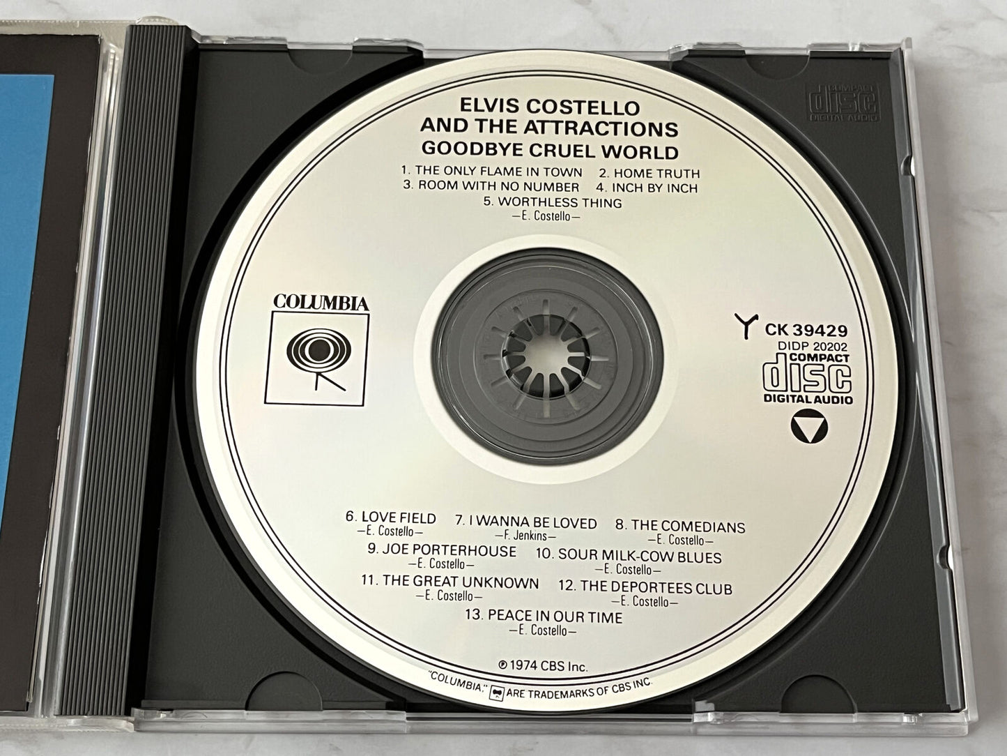 Costello, Elvis & the Attractions, Elvis Costello And The Attractions – Goodbye Cruel World [DADC PRESS]