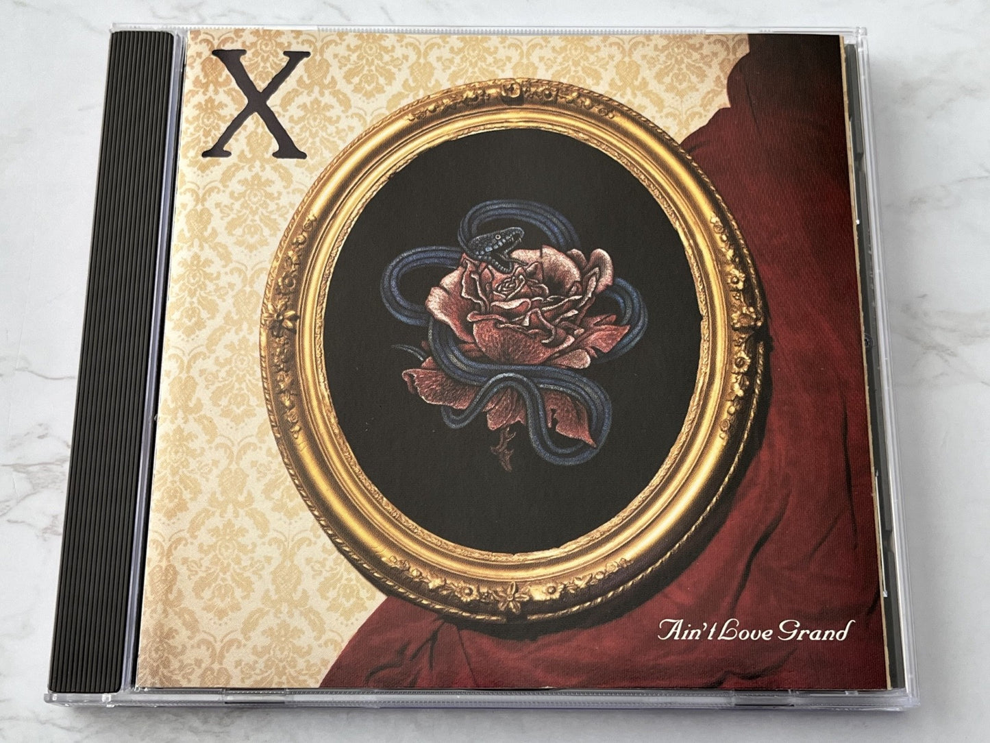 X – Ain't Love Grand [SRC PRESS]