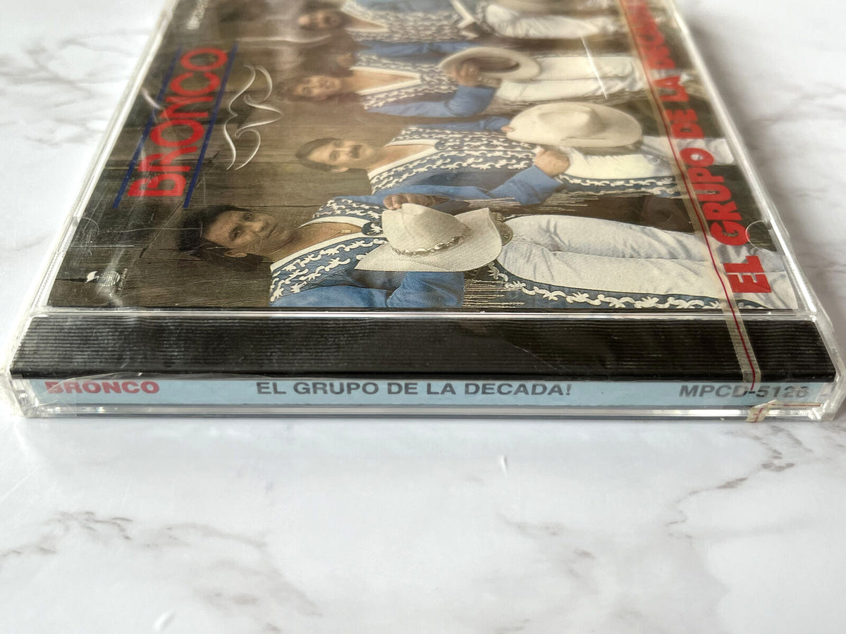 Bronco – El Grupo De La Decada (1991) [ORIGINAL USA PRESS]