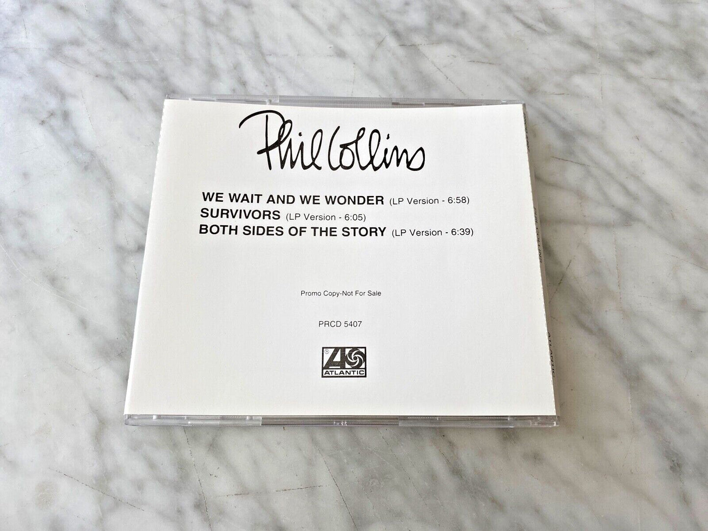 Phil Collins – We Wait And We Wonder (Promo) (1994)