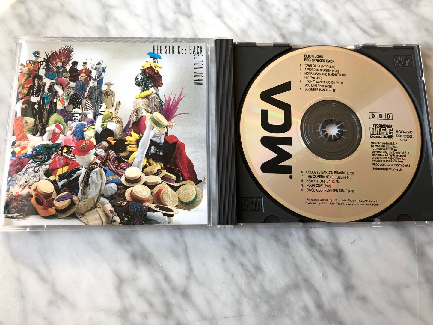 Elton John – Reg Strikes Back [DADC PRESS]