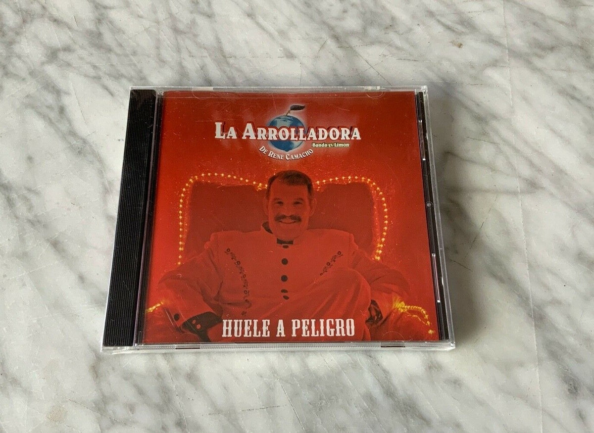La Arrolladora Banda Limon – Huele A Peligro (2004) [ORIGINAL USA PRESS]