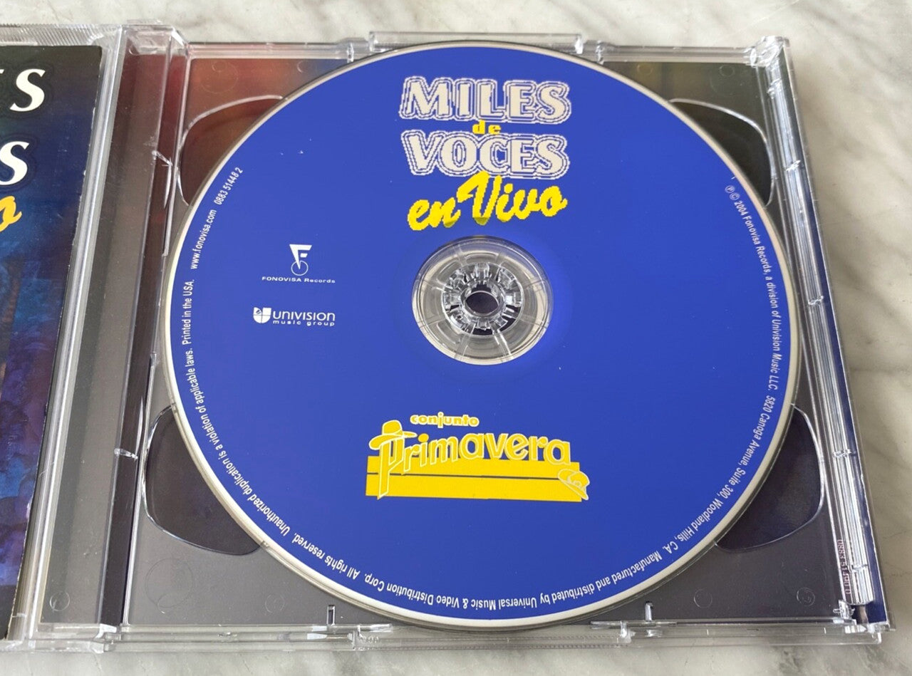Conjunto Primavera – Miles De Voces En Vivo (CD/DVD) (2004) [ORIGINAL USA PRESS]