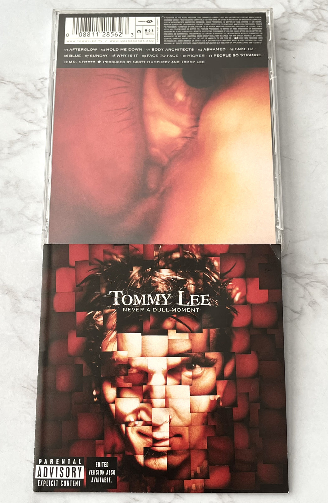 Tommy Lee – Never A Dull Moment (2002)