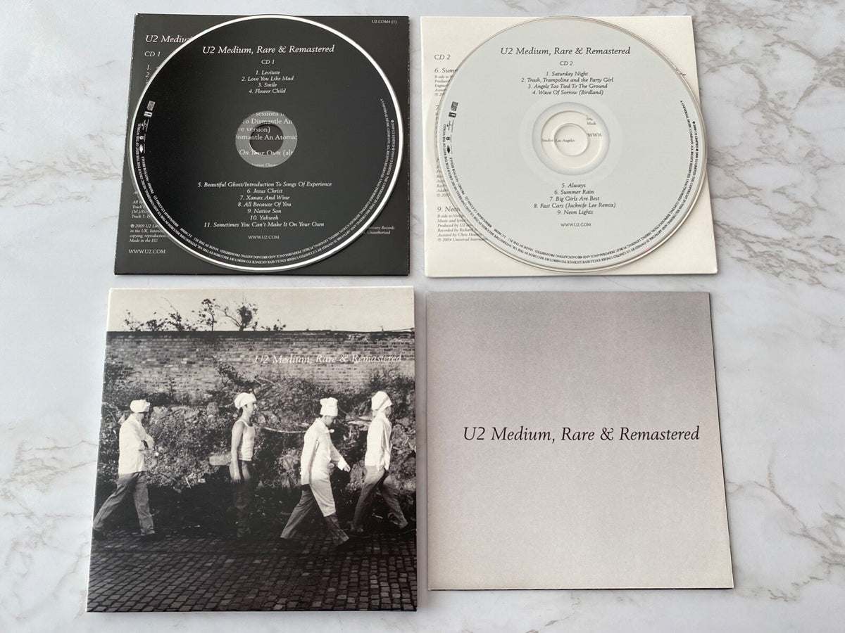 U2 – Medium & Remastered (2009) [UK PRESS]