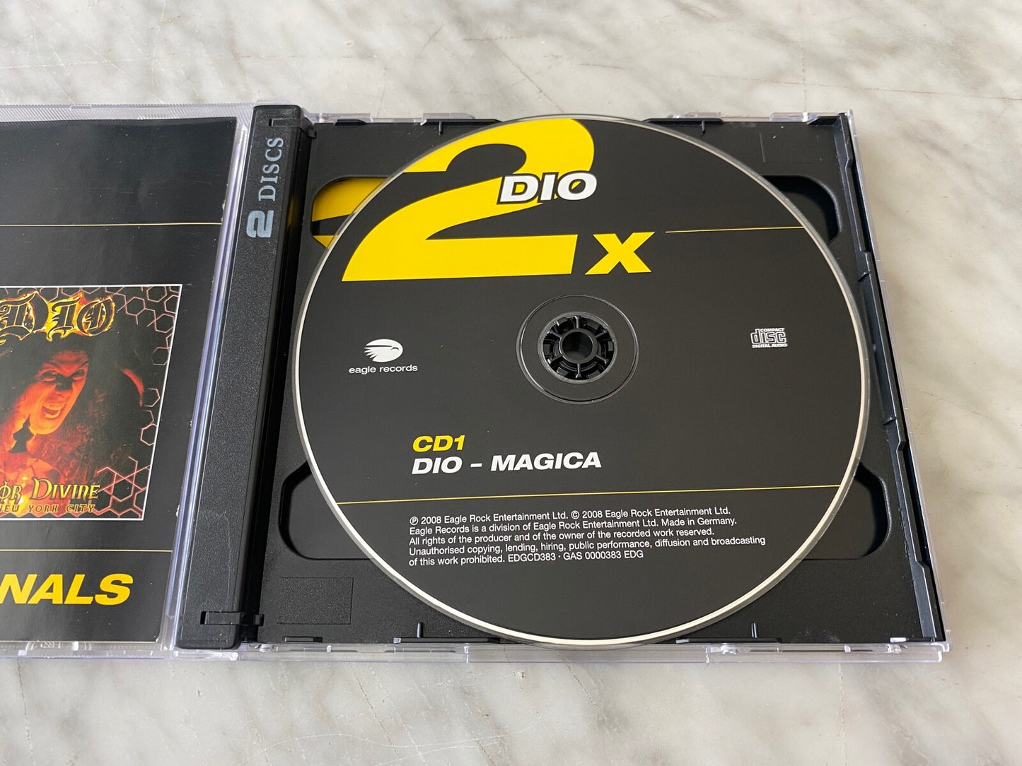 Dio – Magica Evil Or Divine (2008) [GERMAN PRESS]