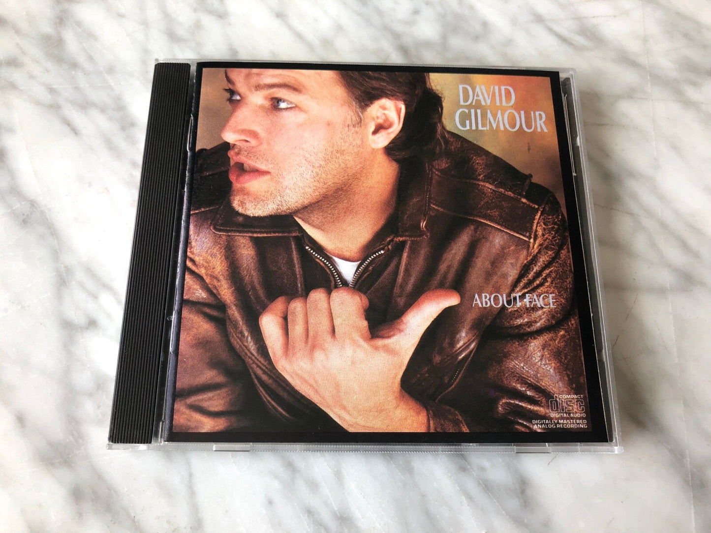 Pink Floyd, David Gilmour – About Face (1984) [DADC PRESS]
