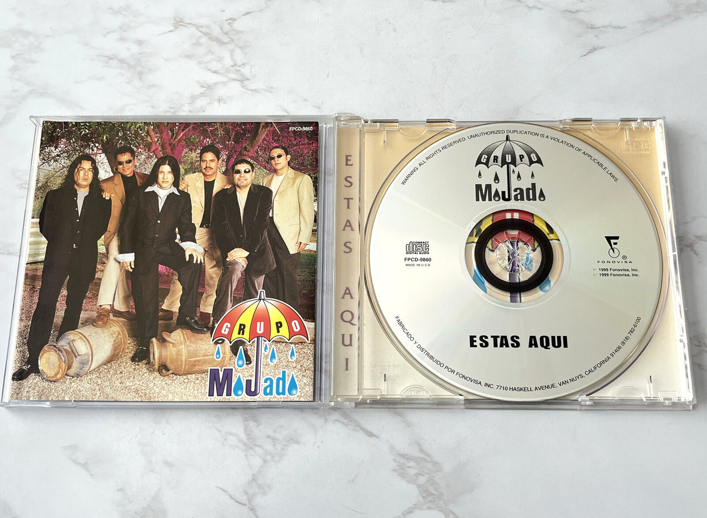 Grupo Mojado – Estas Aquí (1999) [ORIGINAL USA PRESS]