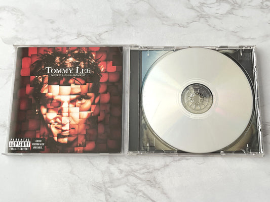 Tommy Lee – Never A Dull Moment (2002)