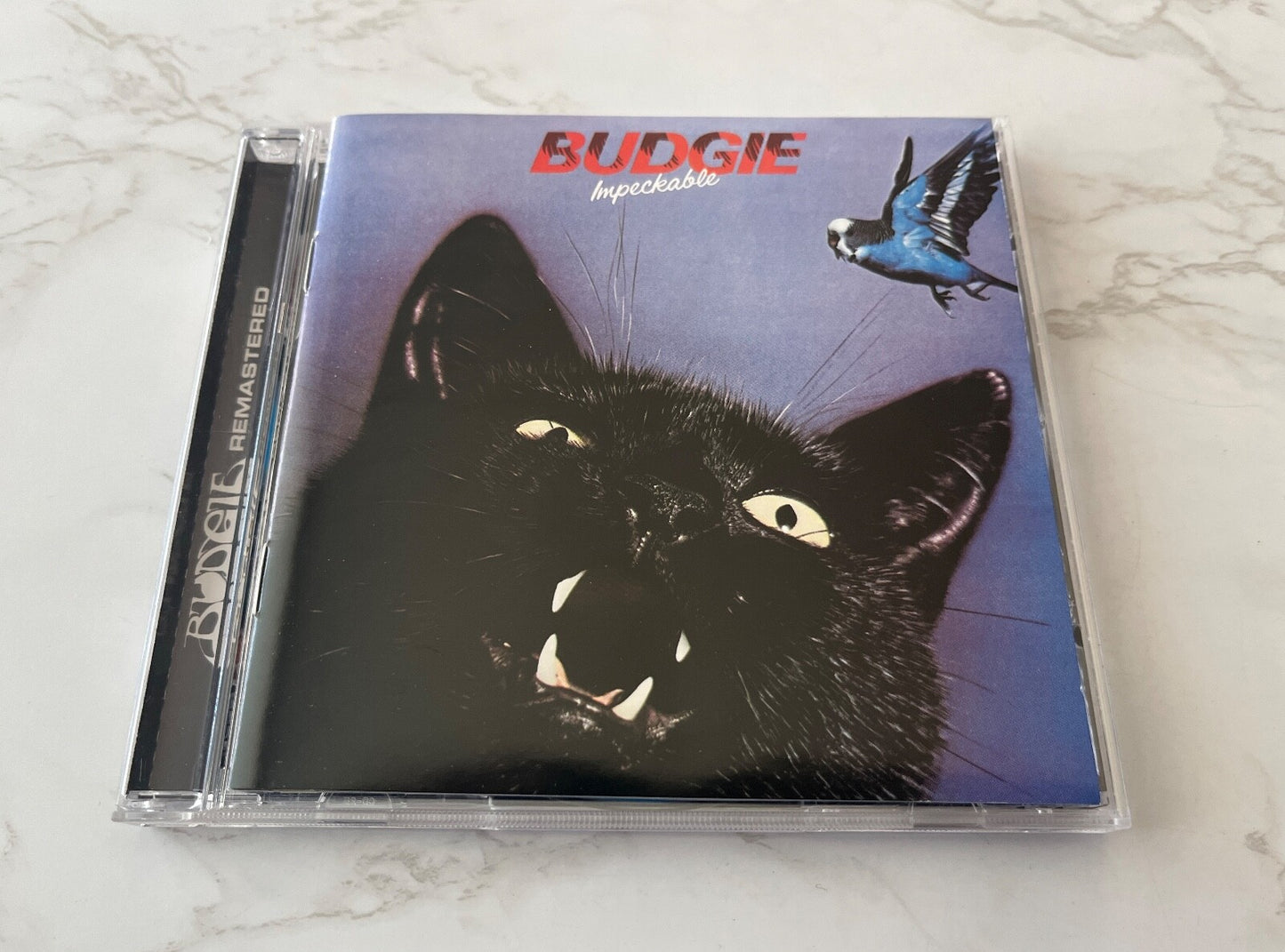 Budgie – Impeckable (2010) [UK PRESS]