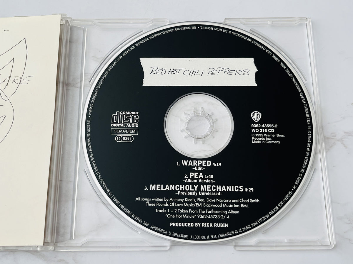 Red Hot Chili Peppers – Warped (Numbered) (1995) [GERMAN PRESS]