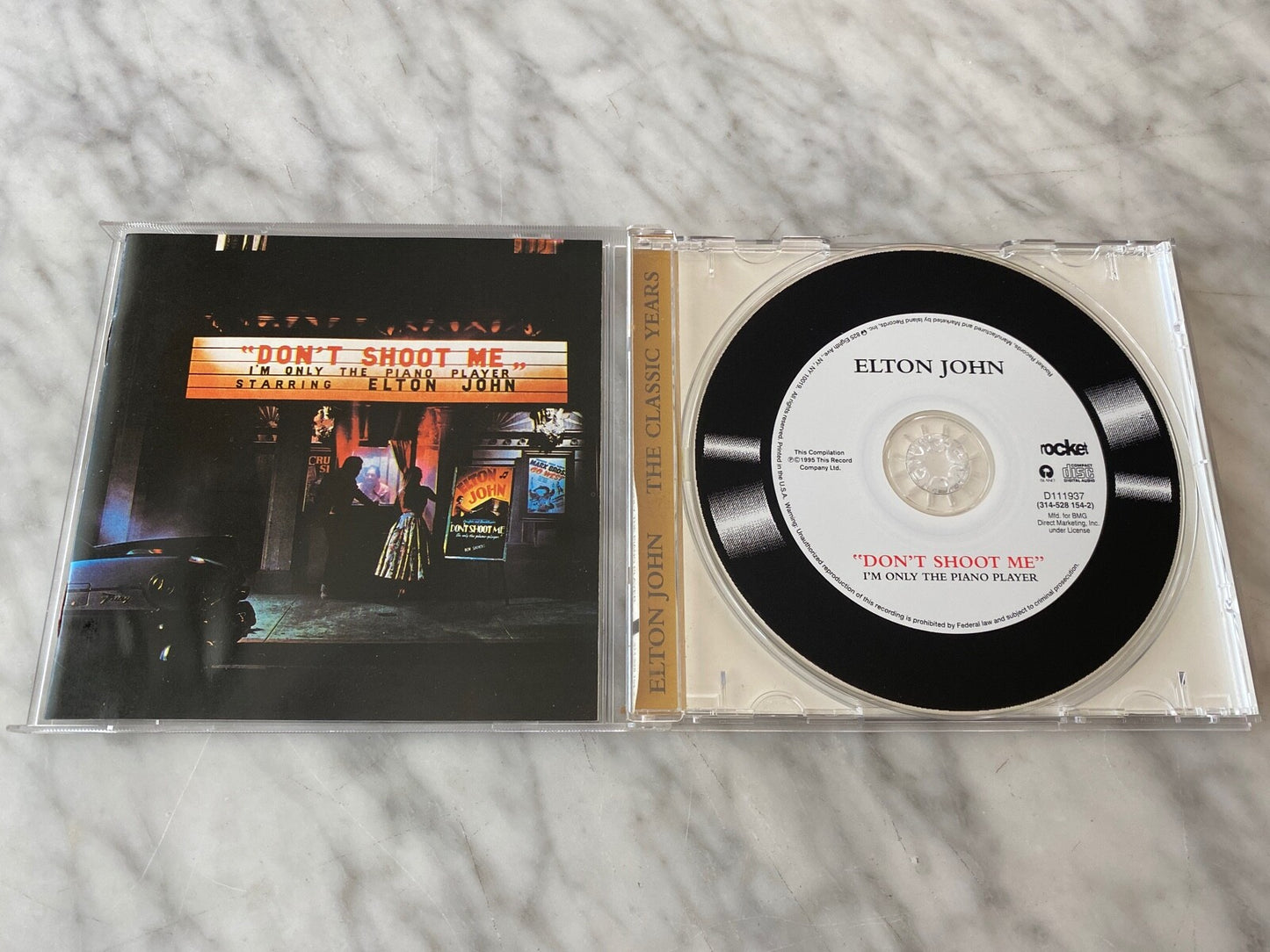 Elton John – Don't Shoot Me I'm Only The Piano Player (1995)