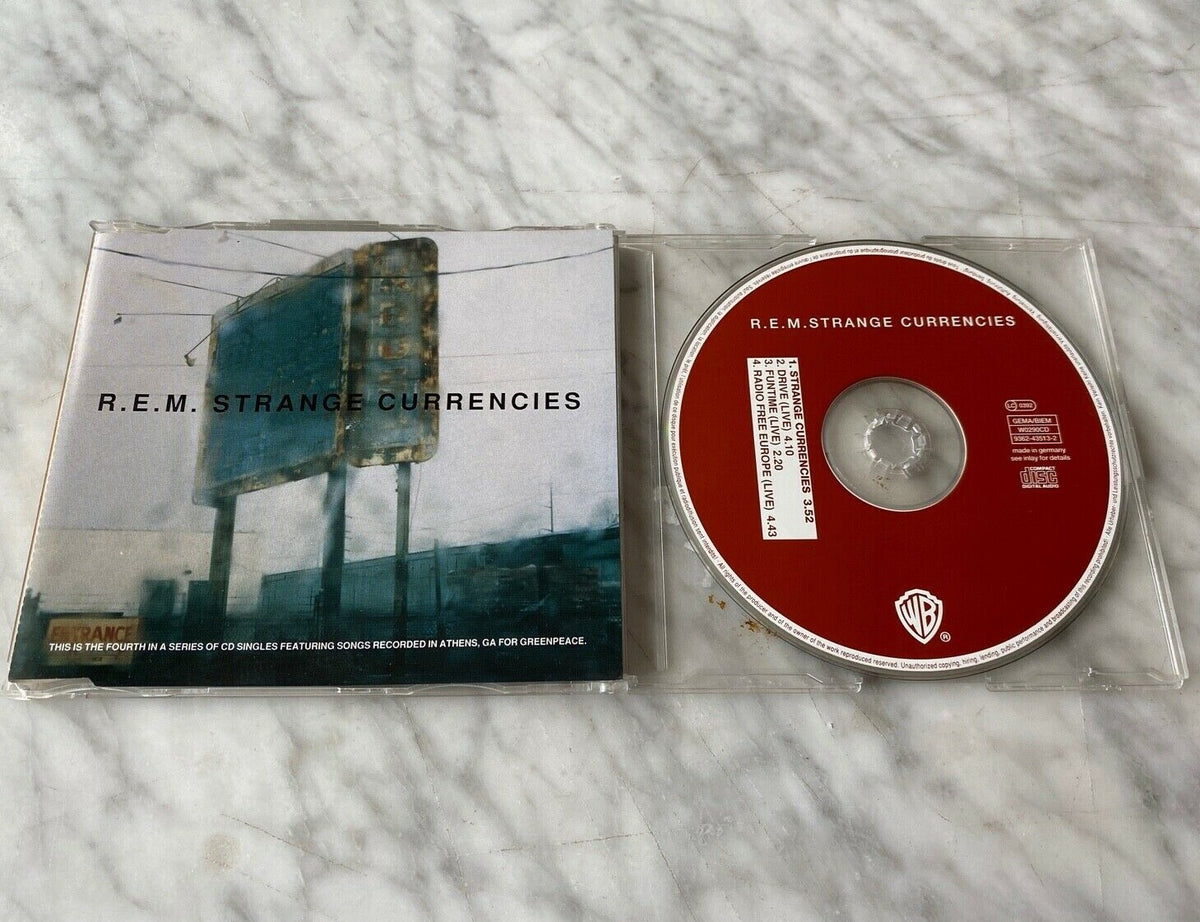 R.E.M. – Strange Currencies (1995) [GERMAN PRESS]
