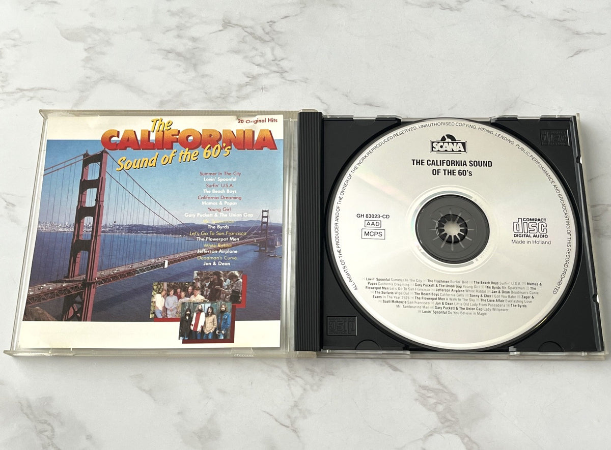 Sonny & Cher, The Beach Boys, The Mamas & the Papas, Various, The Trashmen – The California Sound Of The 60's (1988) [ORIGINAL HOLLAND PRESS]