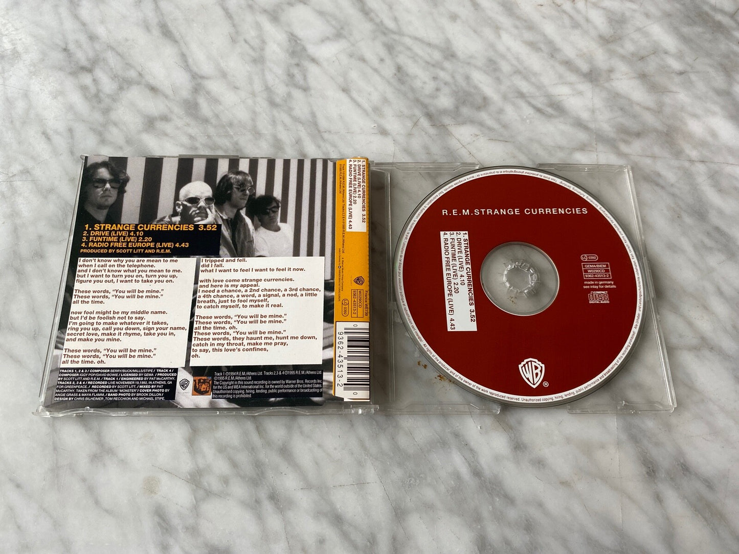 R.E.M. – Strange Currencies (1995) [GERMAN PRESS]